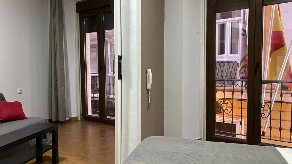 Postel nebo postele na pokoji v ubytování Hostal San Francisco