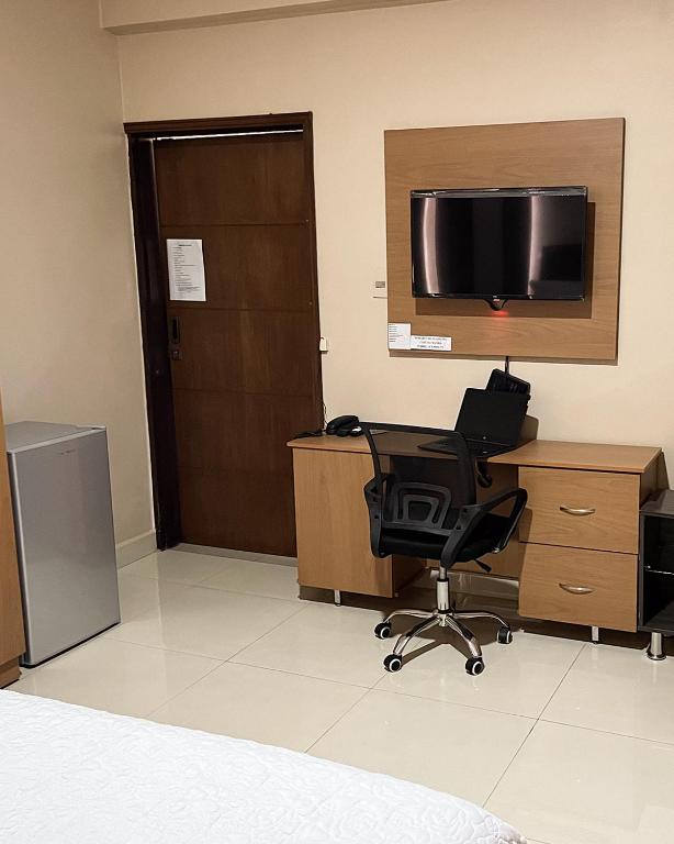 TV a/nebo společenská místnost v ubytování Darling Hotel Ciudad del Este