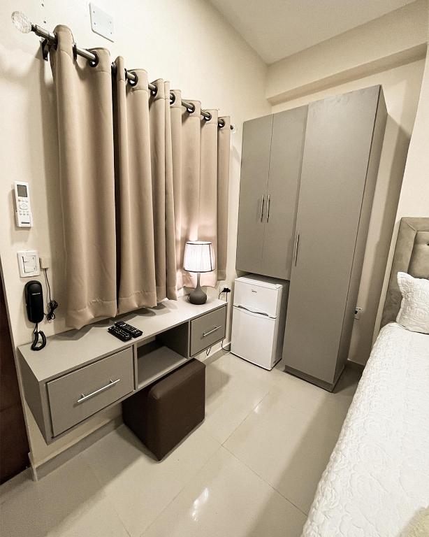 Postel nebo postele na pokoji v ubytování Darling Hotel Ciudad del Este
