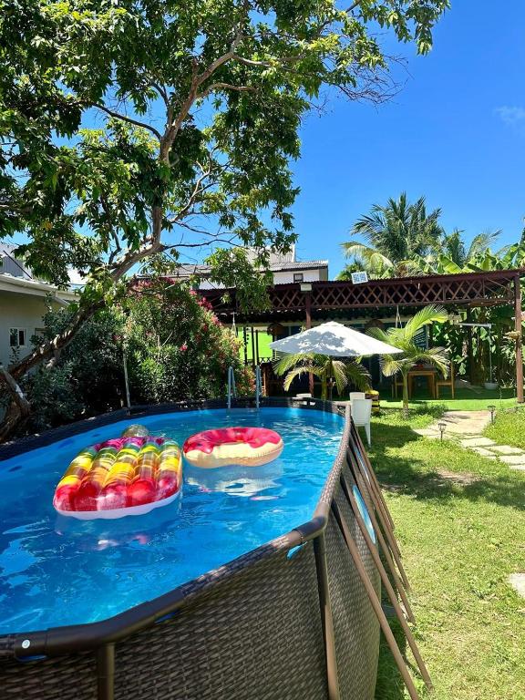 Um jardim em Eco-Hotel Palma É Coco