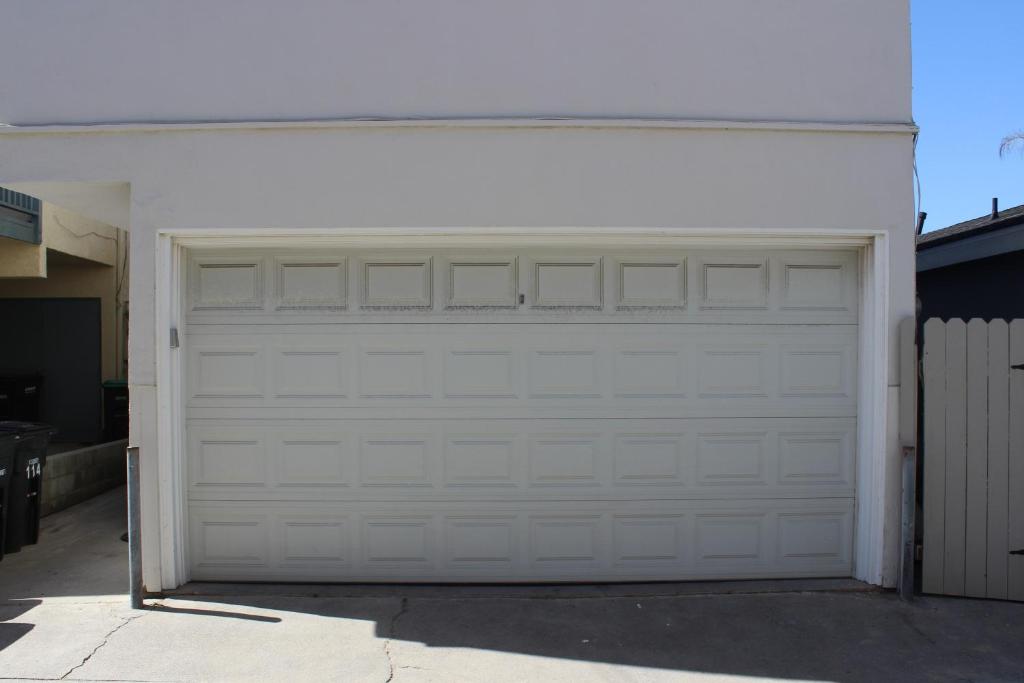 a garage with a white garage door at 114 Forty-Second Street A in Newport Beach
