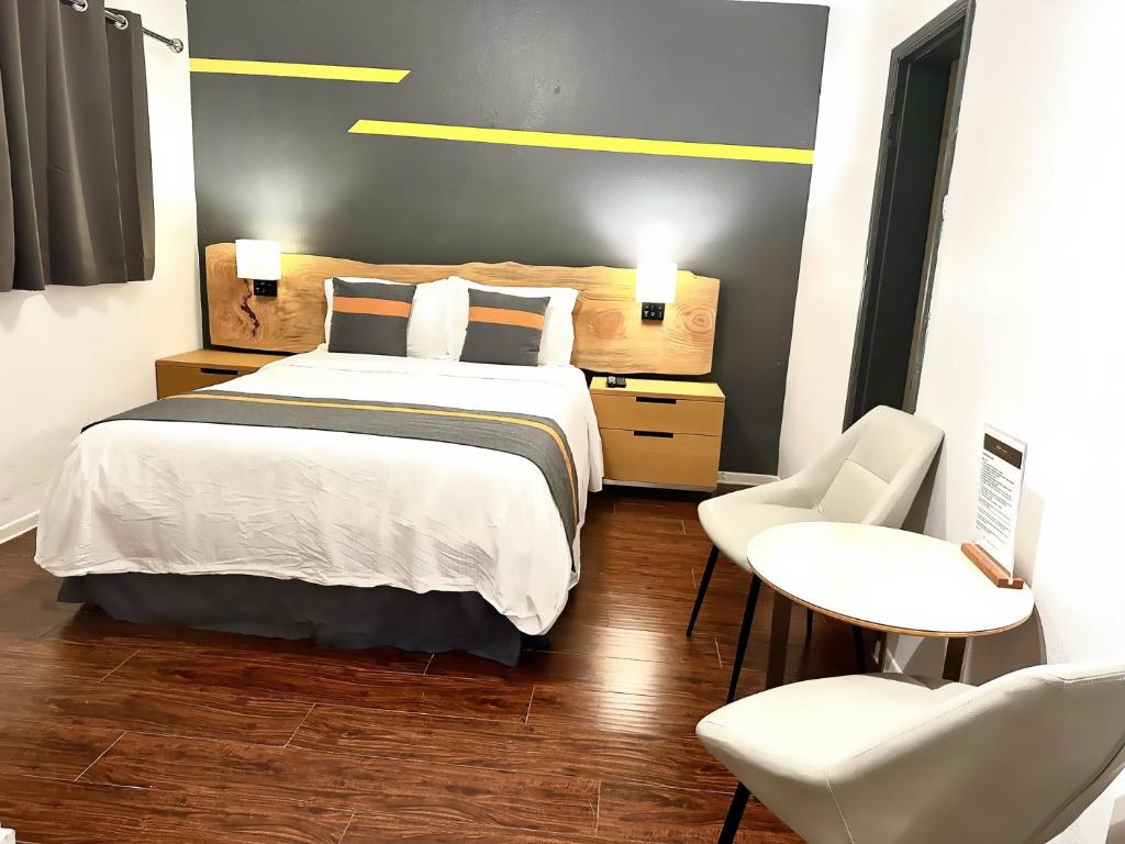 Postel nebo postele na pokoji v ubytování Duncan Motel