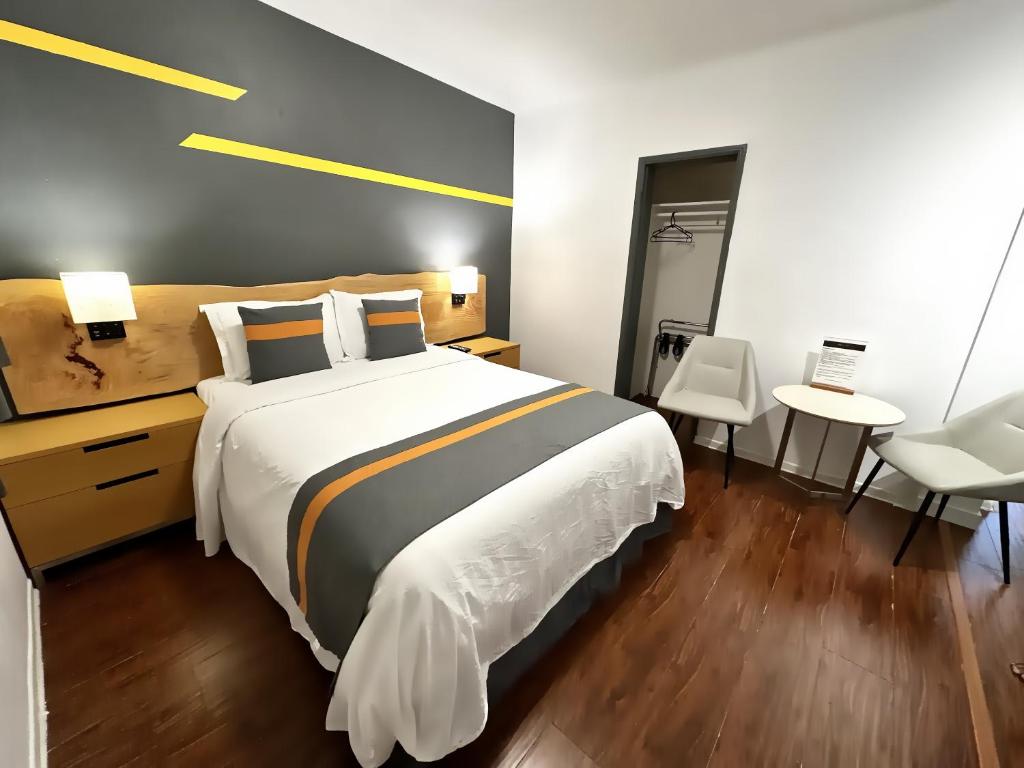 Postel nebo postele na pokoji v ubytování Duncan Motel