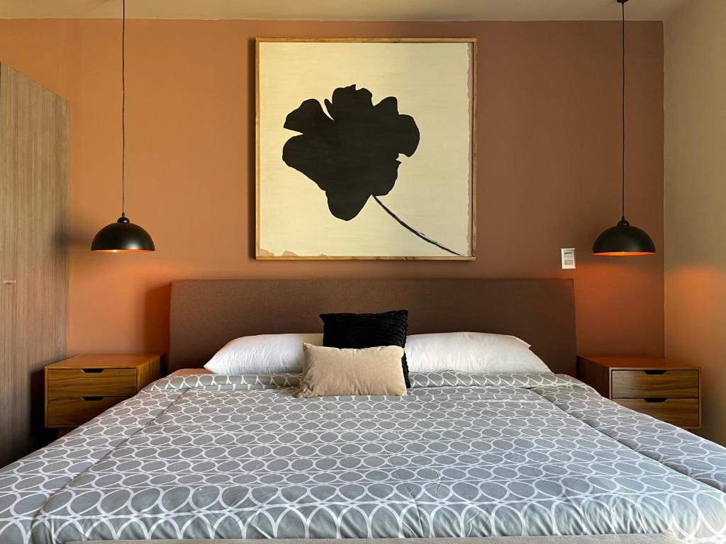 Postel nebo postele na pokoji v ubytování DreamHaus Guadalajara Country Club