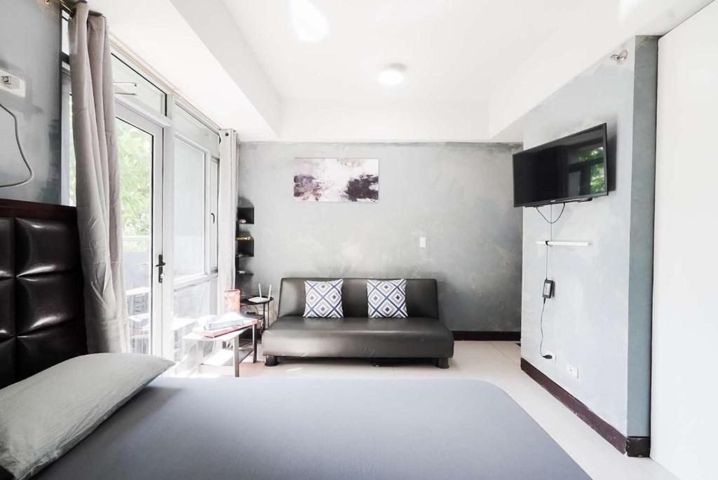 Photo from Cubao Manhattan Heights Residential Condo TA4N - Low Floor Studio with Pool & Balcony, 5 Mins Walk to Gateway Mall & Araneta Coliseum LRT MRT Cubao Quezon City - Staycations by SMS in Quezon City, Manila, Luzon, Philippines