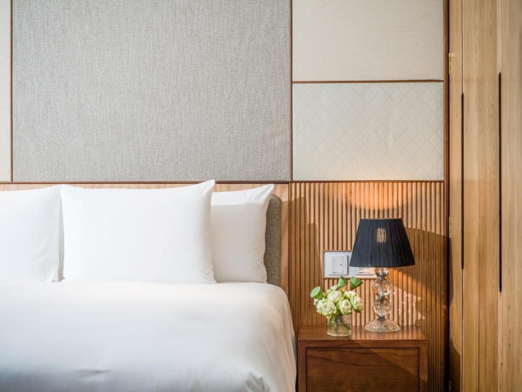 Postel nebo postele na pokoji v ubytování Sheraton Hanoi West