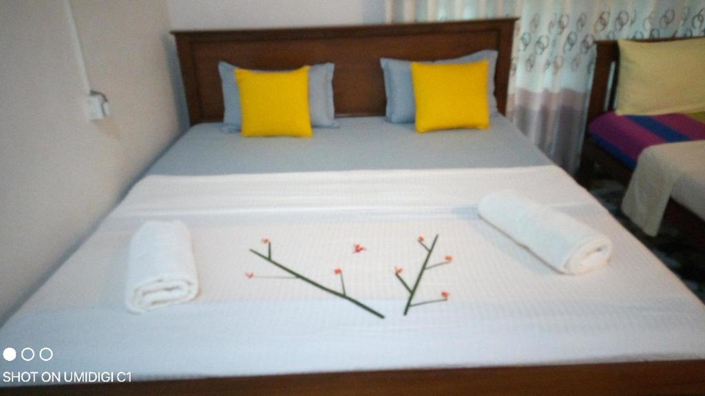 Postel nebo postele na pokoji v ubytování Vihanga Resort