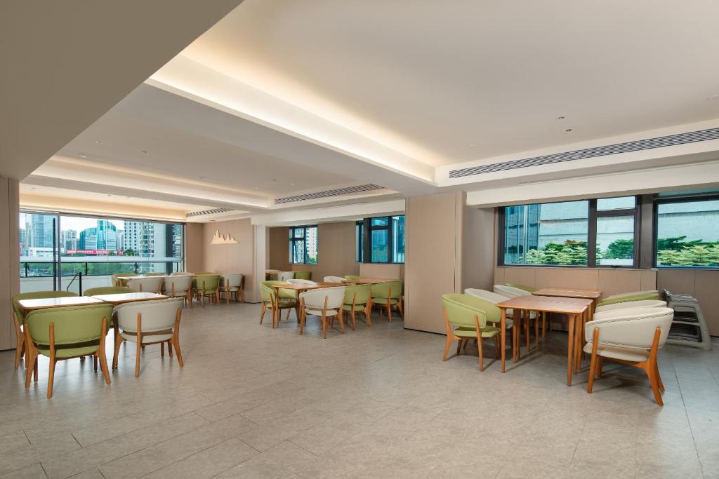 Posezení v ubytování Grandee Rezen - TaiKoo Hui Plaza Shipaiqiao Metro Station