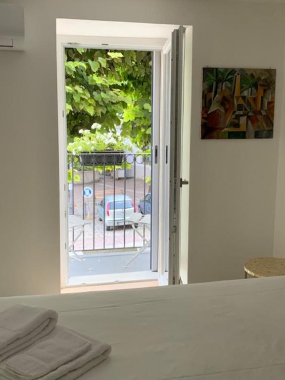 Postel nebo postele na pokoji v ubytování B&B San Francesco Class