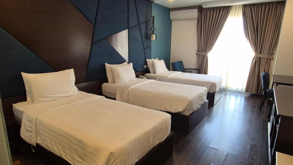 Azalea Parkview Hotel - Chambre Triple