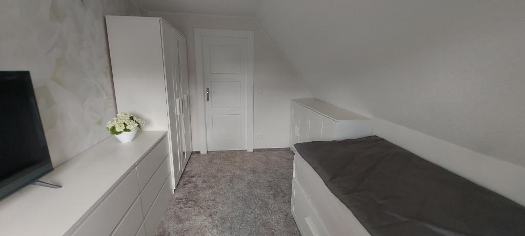 Postel nebo postele na pokoji v ubytování Ferienhaus Landbrücke