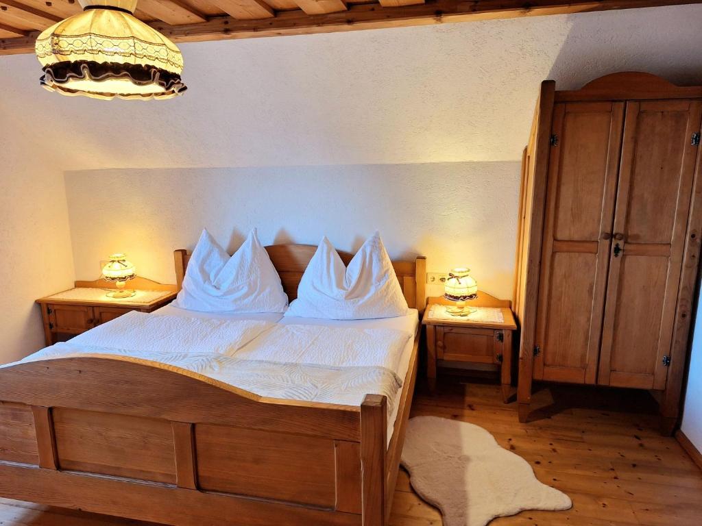 Postel nebo postele na pokoji v ubytování Ferienhütte Panoramablick