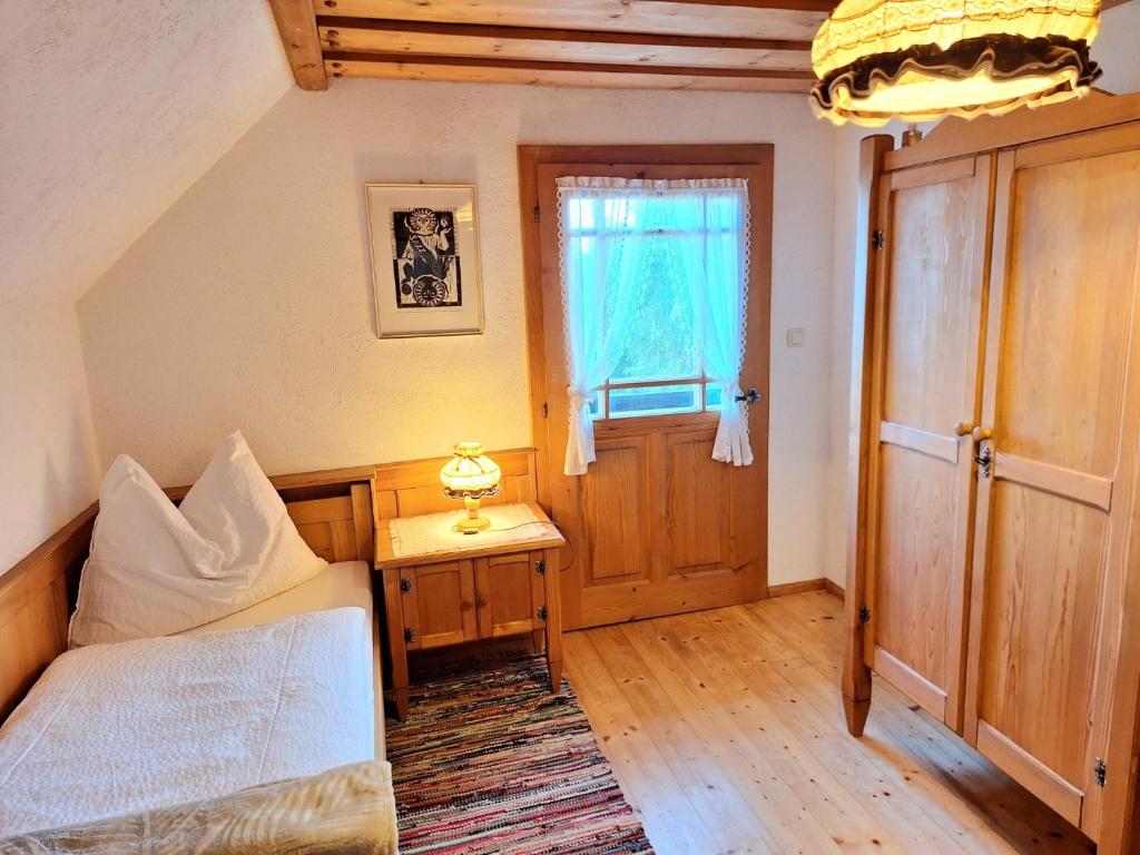 Postel nebo postele na pokoji v ubytování Ferienhütte Panoramablick