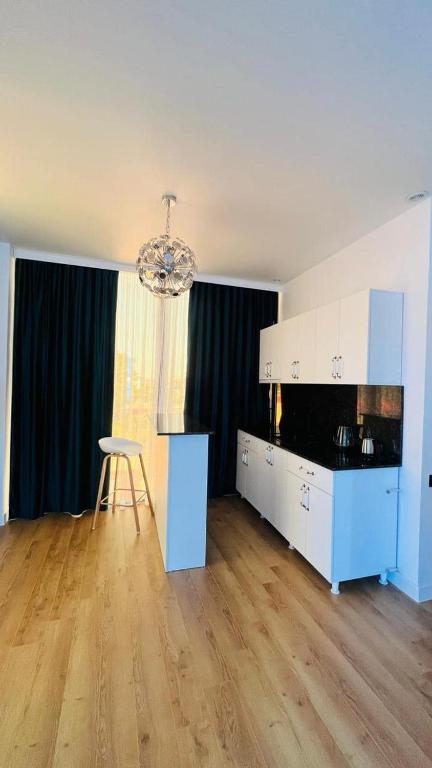 Kuchyň nebo kuchyňský kout v ubytování Hotel Chipo 4