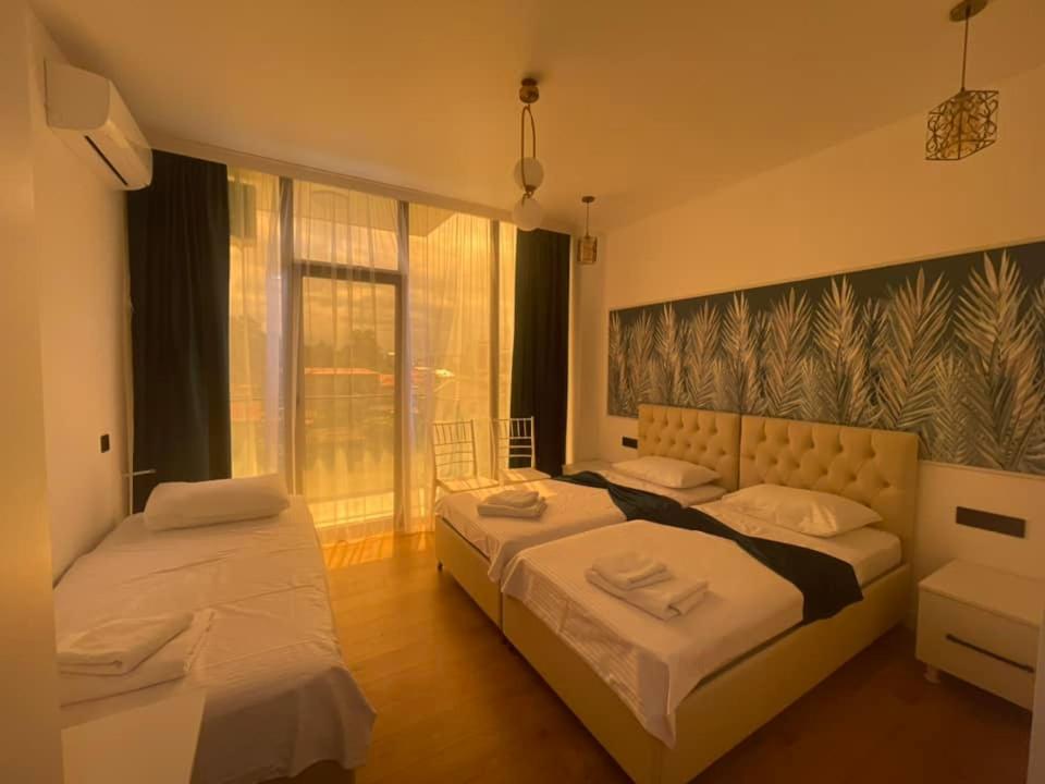 Postel nebo postele na pokoji v ubytování Hotel Chipo 4