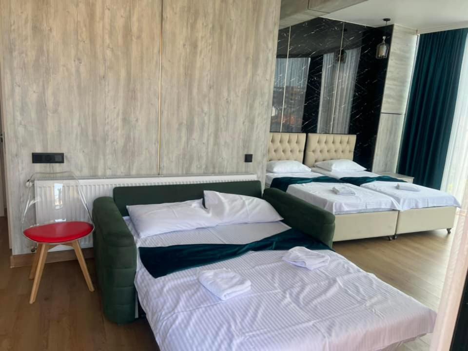 Postel nebo postele na pokoji v ubytování Hotel Chipo 4