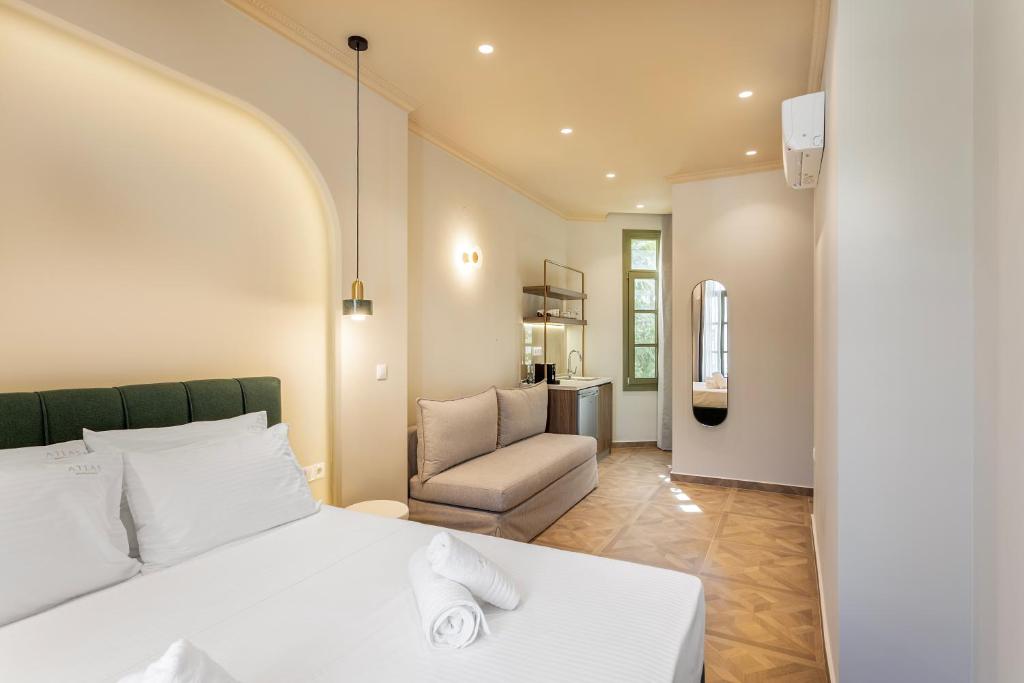 Postel nebo postele na pokoji v ubytování Atlas Boutique Suites