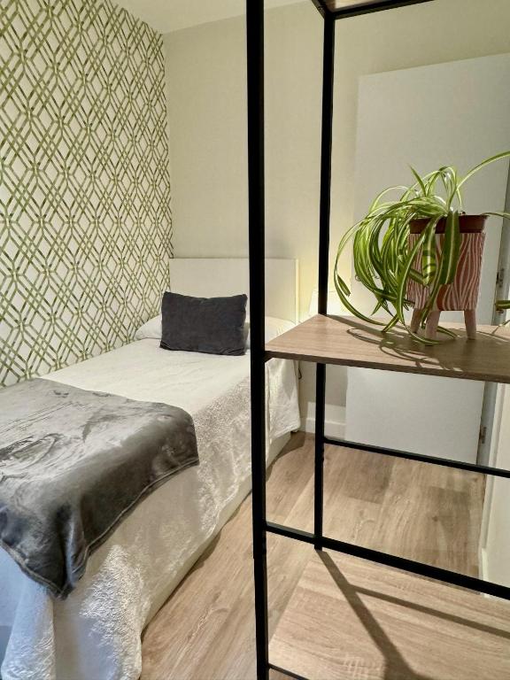 Postel nebo postele na pokoji v ubytování Apartamento Quintana