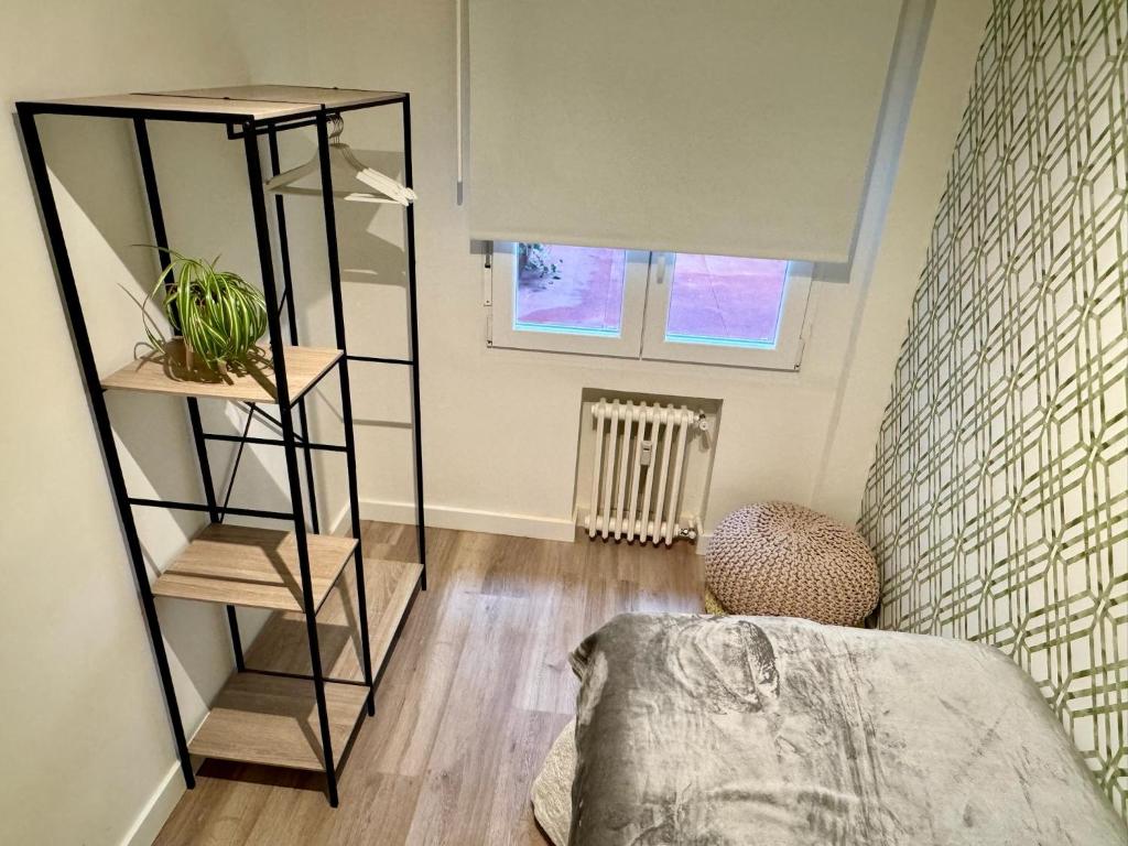 Postel nebo postele na pokoji v ubytování Apartamento Quintana