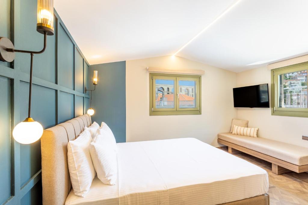 Postel nebo postele na pokoji v ubytování Atlas Boutique Suites