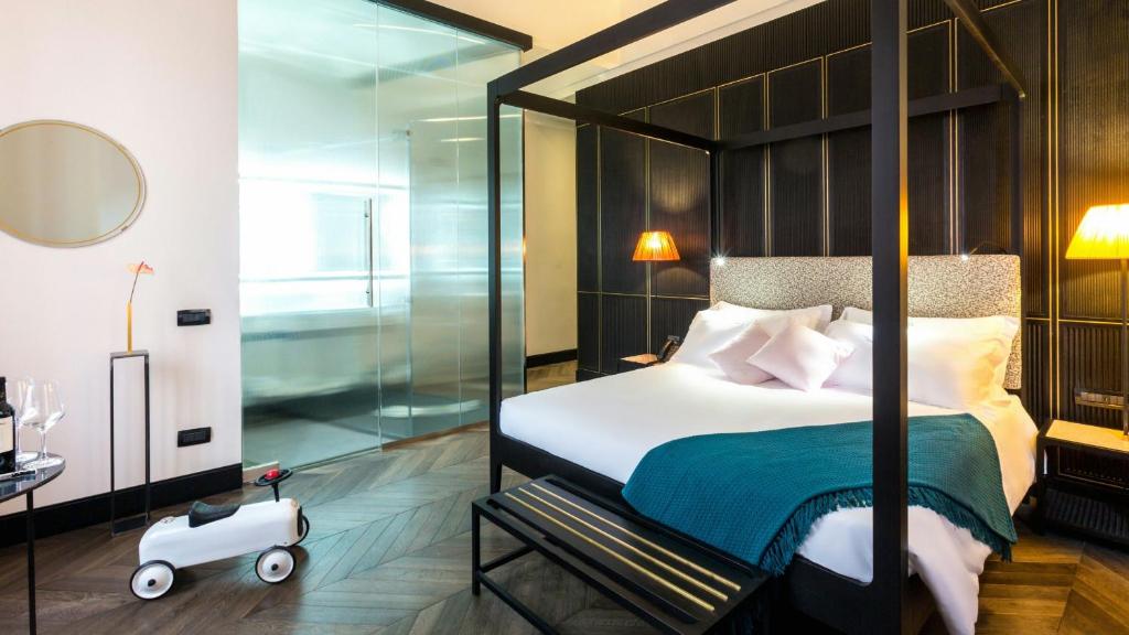 Postel nebo postele na pokoji v ubytování Hotel The Haven Roma