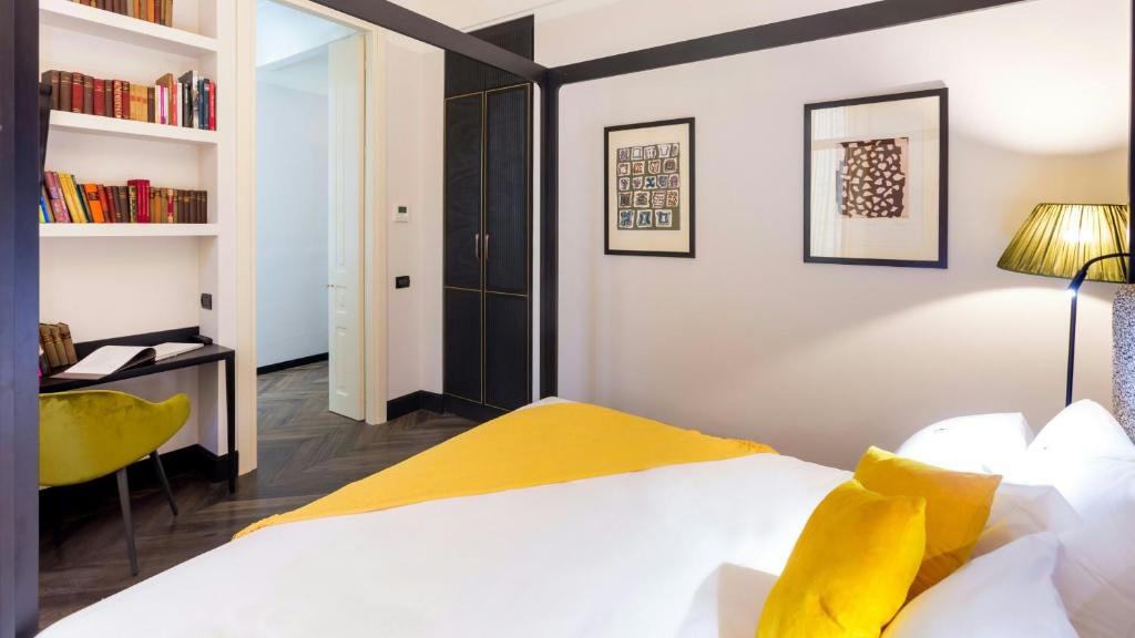 Postel nebo postele na pokoji v ubytování Hotel The Haven Roma