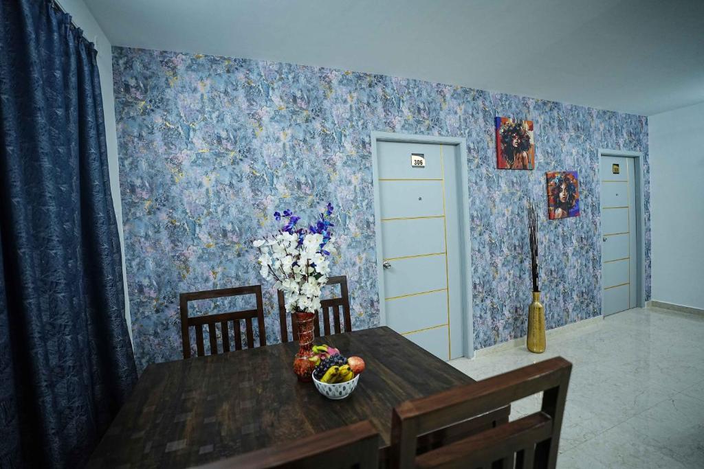 Fotografie z fotogalerie ubytování Yellow Bells Studios And Suites v destinaci Gachibowli
