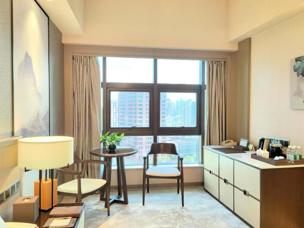 Kuchyň nebo kuchyňský kout v ubytování Jin Jiang Pine City Hotel