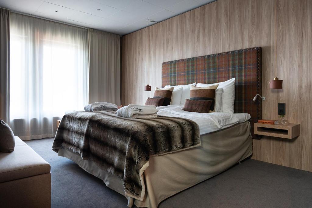 Postel nebo postele na pokoji v ubytování KUST Hotell & SPA
