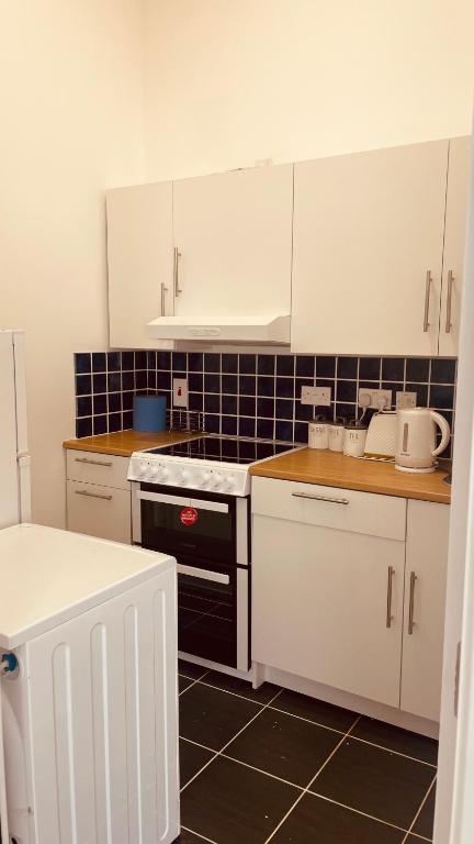 Kuchyň nebo kuchyňský kout v ubytování Colton House - Apt 3