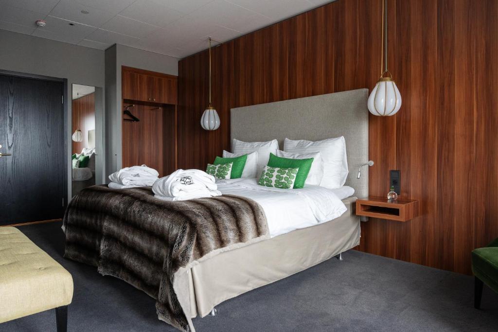 Postel nebo postele na pokoji v ubytování KUST Hotell & SPA