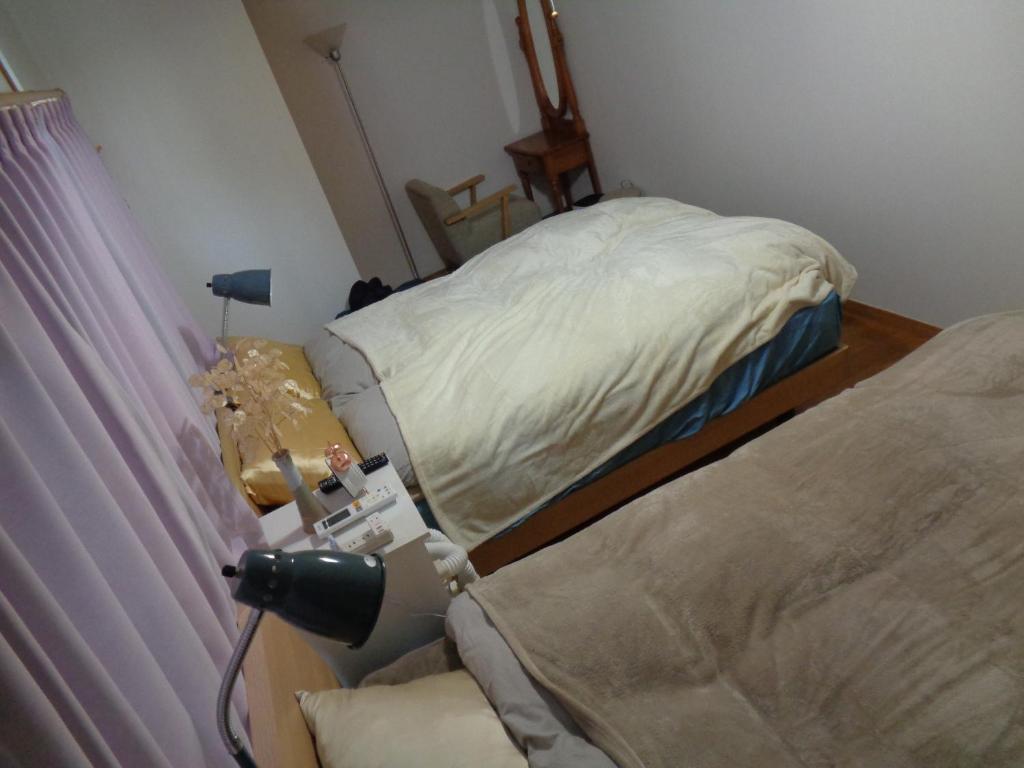 Postel nebo postele na pokoji v ubytování Premium Guest House Alaskan Dream