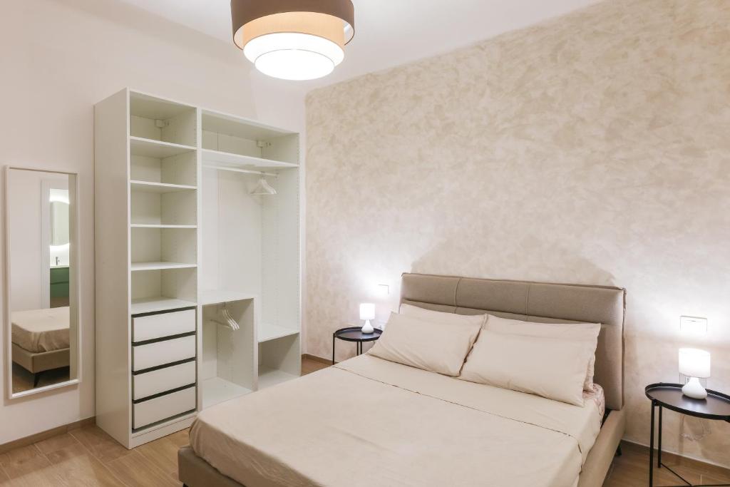 Postel nebo postele na pokoji v ubytování Angolo dei Sassi