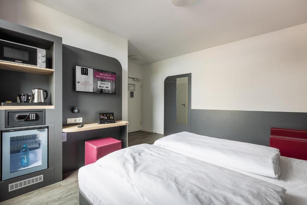 SMARTY Airport Cologne Hotel - KONTAKTLOSER SELF CHECK-IN - Resim 39