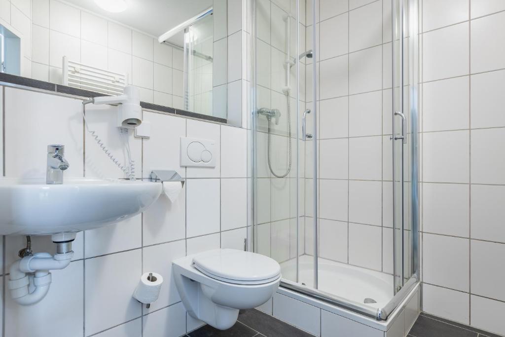 Koupelna v ubytování SMARTY Airport Cologne Hotel - KONTAKTLOSER SELF CHECK-IN