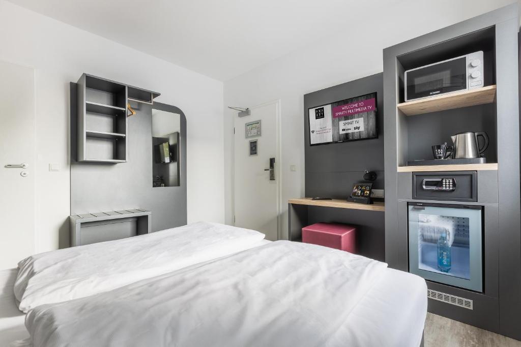 SMARTY Airport Cologne Hotel - KONTAKTLOSER SELF CHECK-IN - Resim 45