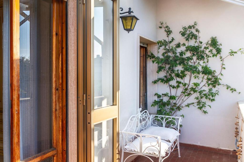 Balkón alebo terasa v ubytovaní Toscana Grande Appartamento in Villa con 2 camere, terrazze, giardino e posto auto privato Tutti spazi uso esclusivo