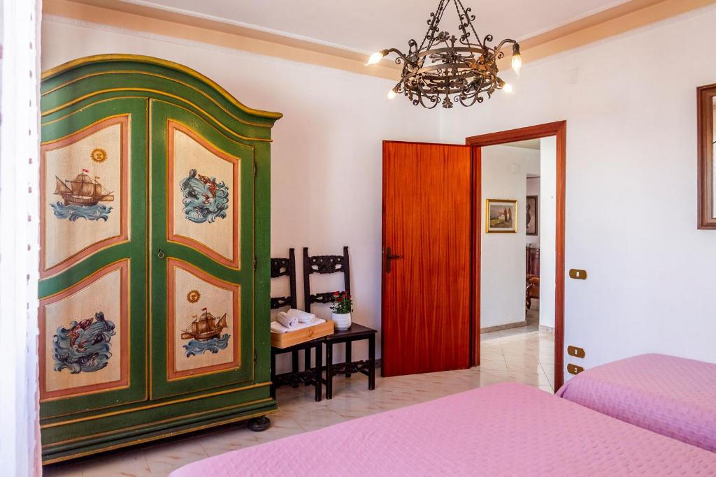 Posteľ alebo postele v izbe v ubytovaní Toscana Grande Appartamento in Villa con 2 camere, terrazze, giardino e posto auto privato Tutti spazi uso esclusivo