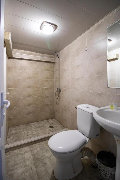 Koupelna v ubytování HotelHarmony