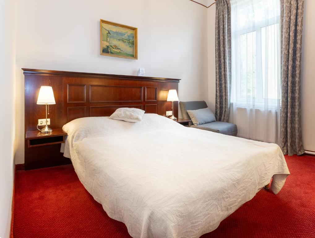 Voodi või voodid majutusasutuse Hotel Viktoria Schönbrunn toas
