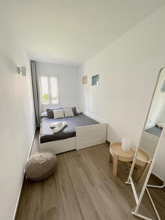 Łóżko lub łóżka w pokoju w obiekcie Apartamento Lia en Port Addaia, piscina y barbacoa, perfecto para vacaciones