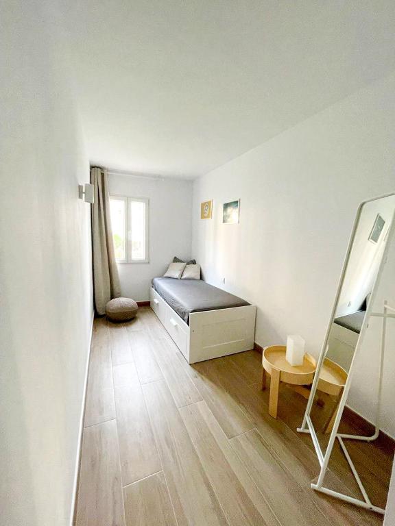 Łóżko lub łóżka w pokoju w obiekcie Apartamento Lia en Port Addaia, piscina y barbacoa, perfecto para vacaciones
