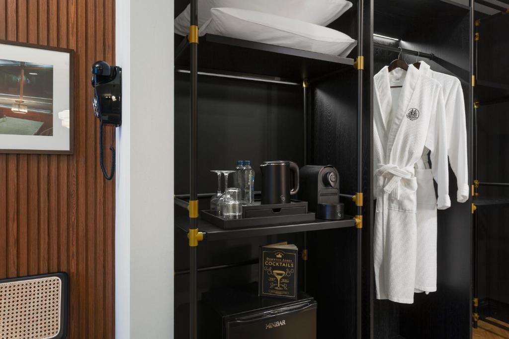 Příslušenství pro přípravu čaje a kávy v ubytování Artizan - Design Hotel