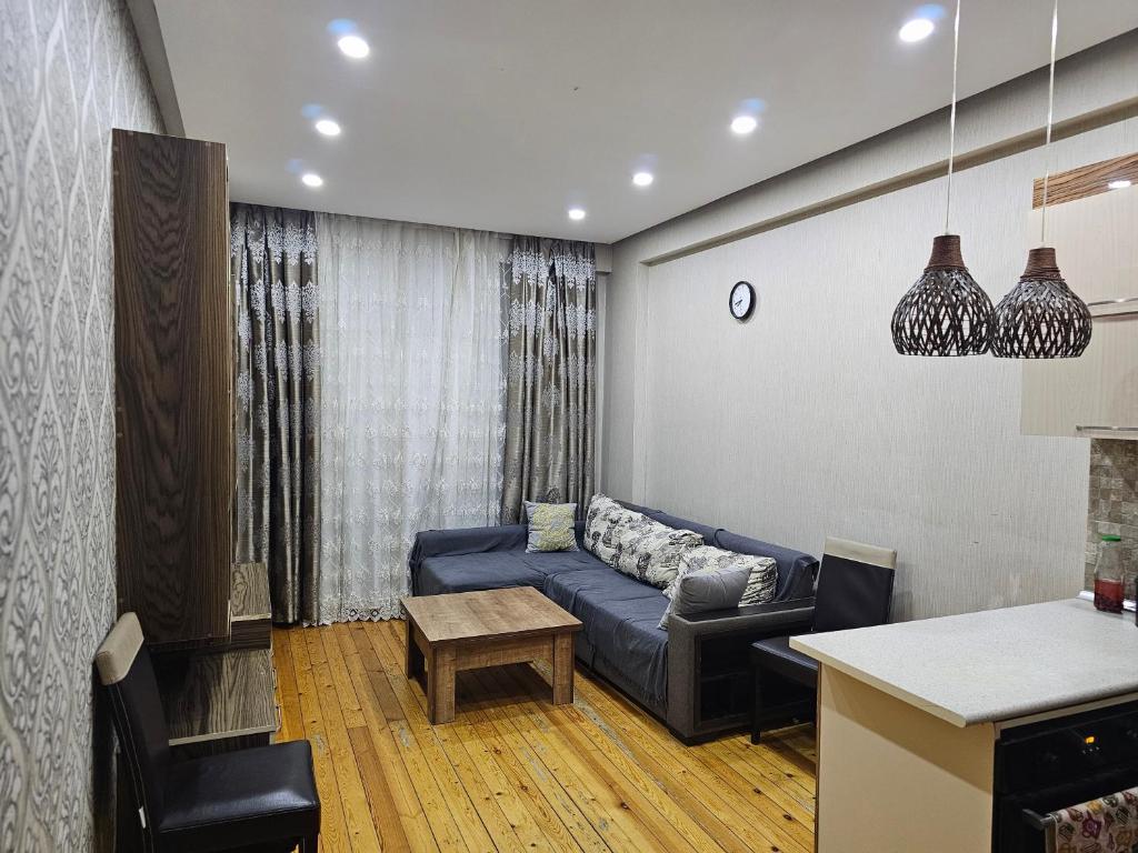 Χώρος καθιστικού στο Jade's Apartment