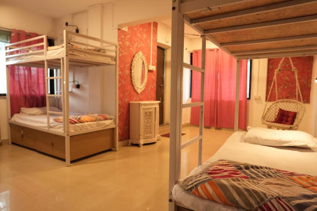 Postel nebo postele na pokoji v ubytování Hostell One - A complete backpacker & Coworking Hub