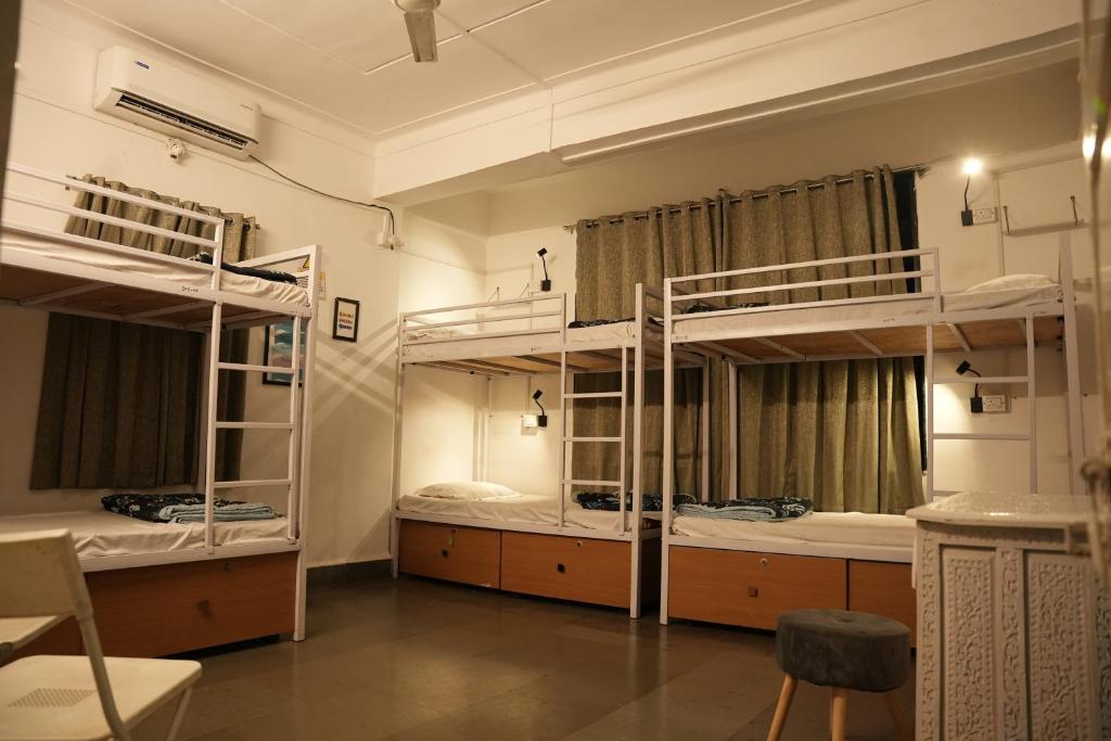 Postel nebo postele na pokoji v ubytování Hostell One - A complete backpacker & Coworking Hub