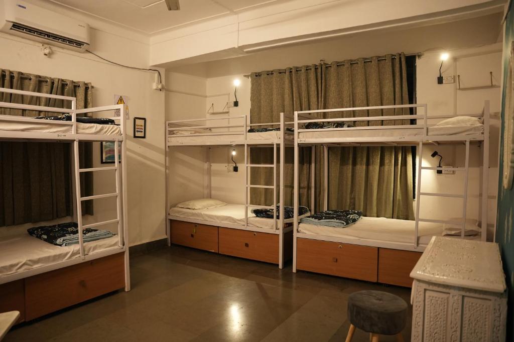 Postel nebo postele na pokoji v ubytování Hostell One - A complete backpacker & Coworking Hub
