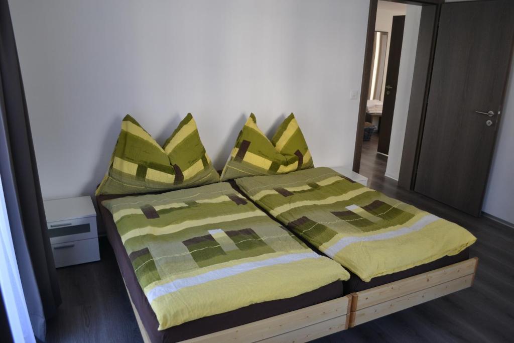 Postel nebo postele na pokoji v ubytování Haus Bergtreu