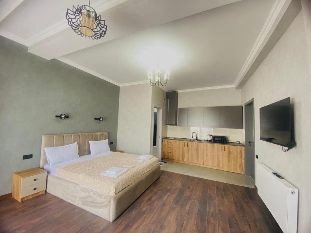 Postel nebo postele na pokoji v ubytování Hotel Garden