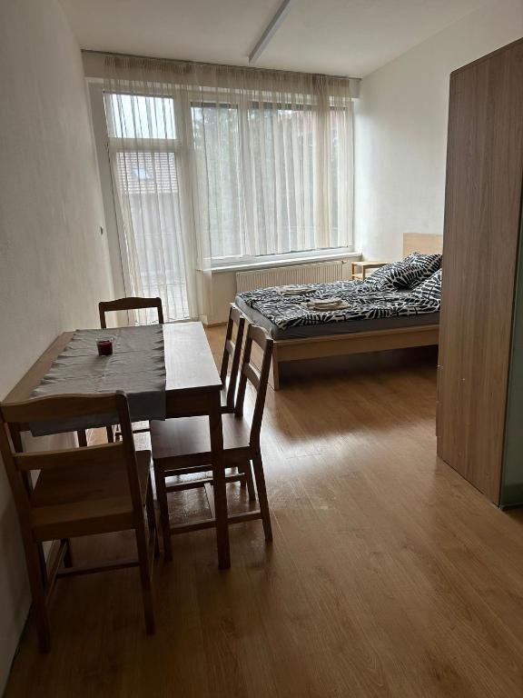 Postel nebo postele na pokoji v ubytování Rezidence - Vídeňská